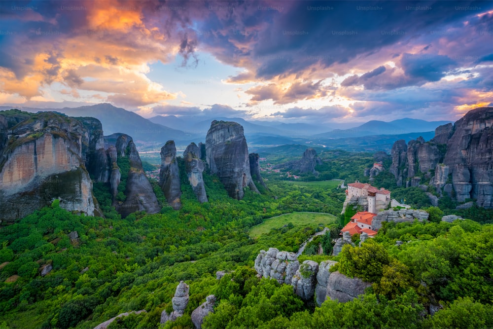 Monastery of Rousanou and Monastery of St. Nicholas Anapavsa in famous greek tourist destination Meteora in Greece on sunset