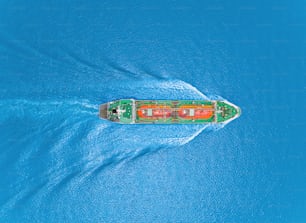 Aerial top view Oil ship tanker or LPG tanker transportation oil from refinery on the sea.