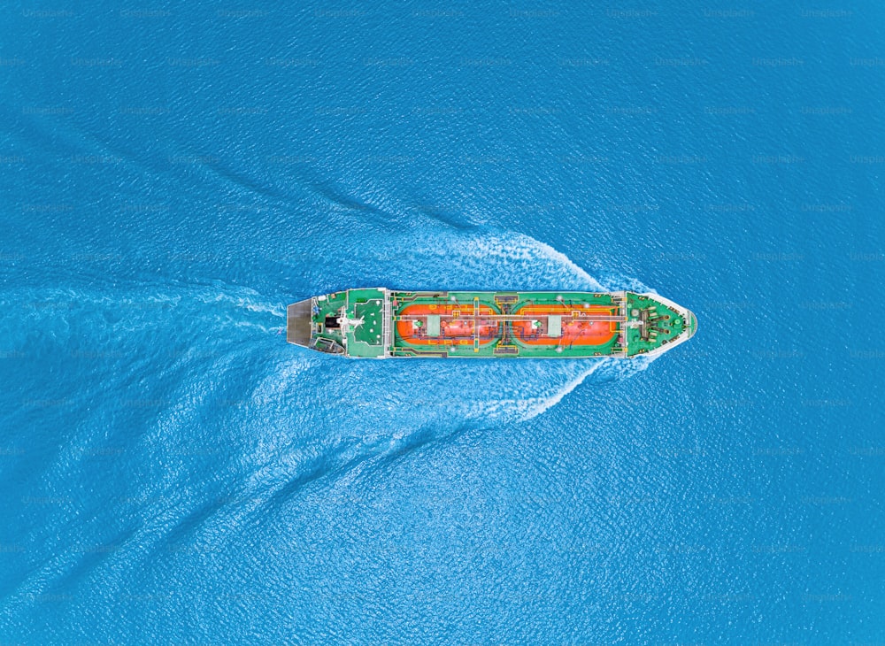 Aerial top view Oil ship tanker or LPG tanker transportation oil from refinery on the sea.