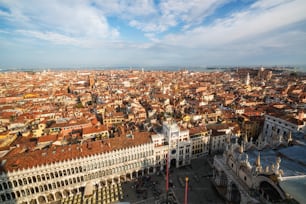 Aerial view of Venice city skyline from St. Mark's Square (Piazza San Marco) in Venice - Italy in sunny summer day. Venice is famous travel destination of Italy for its unique city and culture.