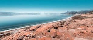 Lake Burdur in Turkey, which dries up in the summer heat, exposes the white mineral limestone on the coast.