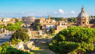 Rome, Italy city skyline with landmarks of the Ancient Rome ; Colosseum and Roman Forum, the famous travel destination of Italy.