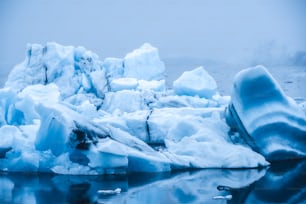 Icebergs in Jokulsarlon beautiful glacial lagoon in Iceland. Jokulsarlon is a famous travel destination in Vatnajokull National Park, southeast Iceland, Europe. Winter landscape.