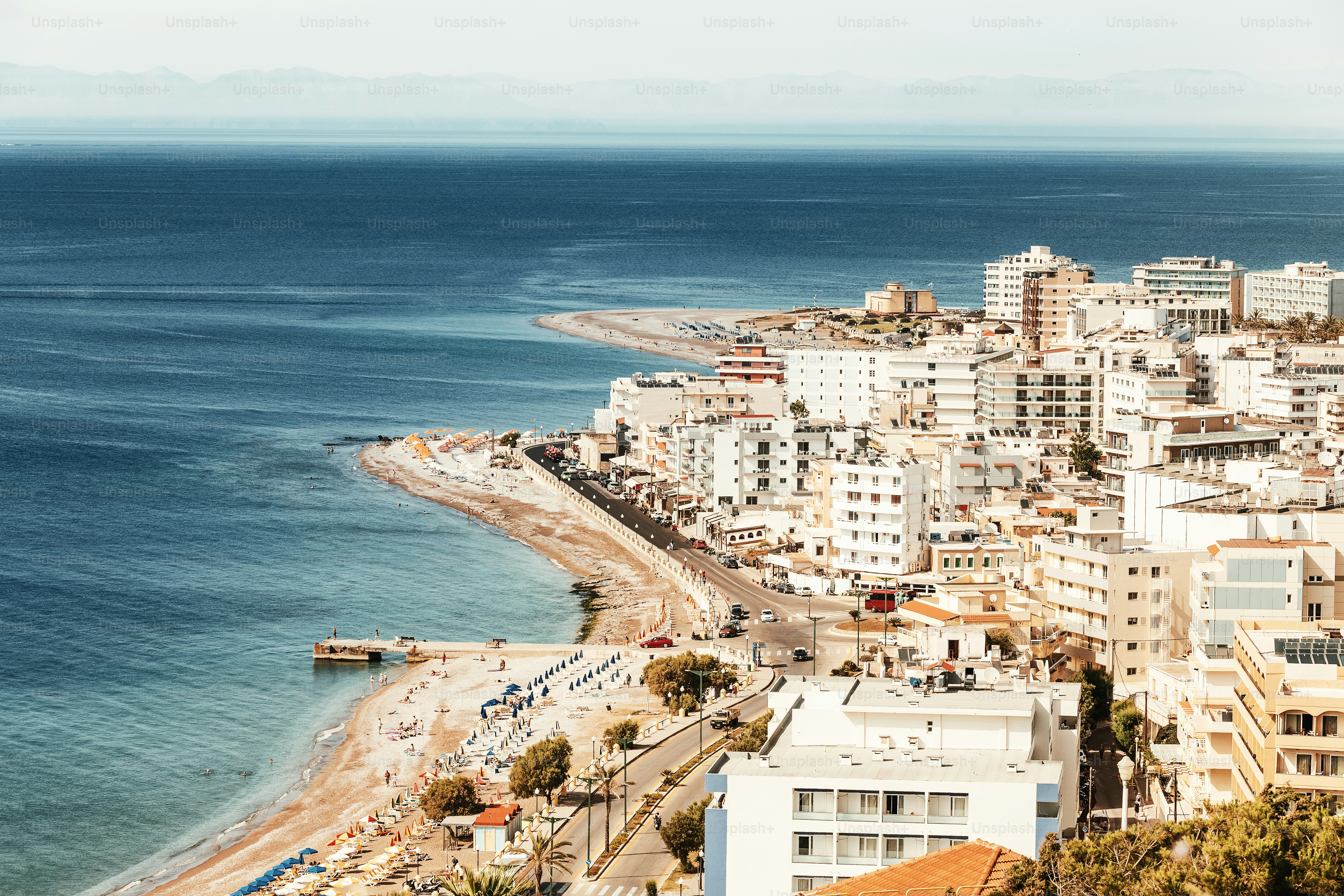 Resort town with many hotels on the sea coast , aerial view
