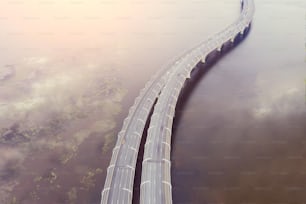 Autopista de alta velocidad, carretera de tráfico, el puente que cruza el río del mar de la bahía. Vista aérea desde arriba