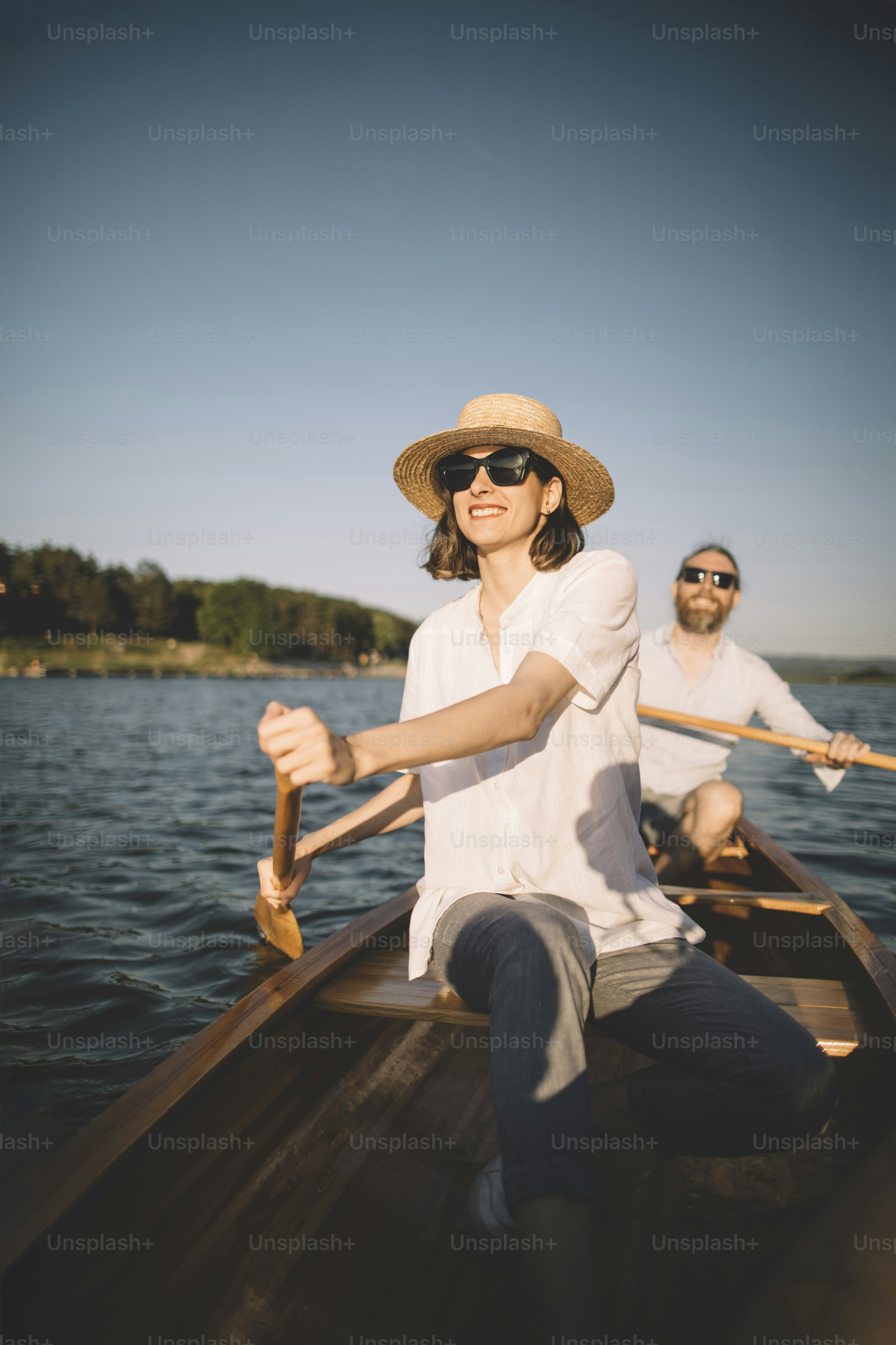 Young copuple enjoy summer canoe ride on the lake. photo – Relaxation ...