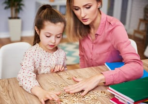 Focused child learning the alphabet