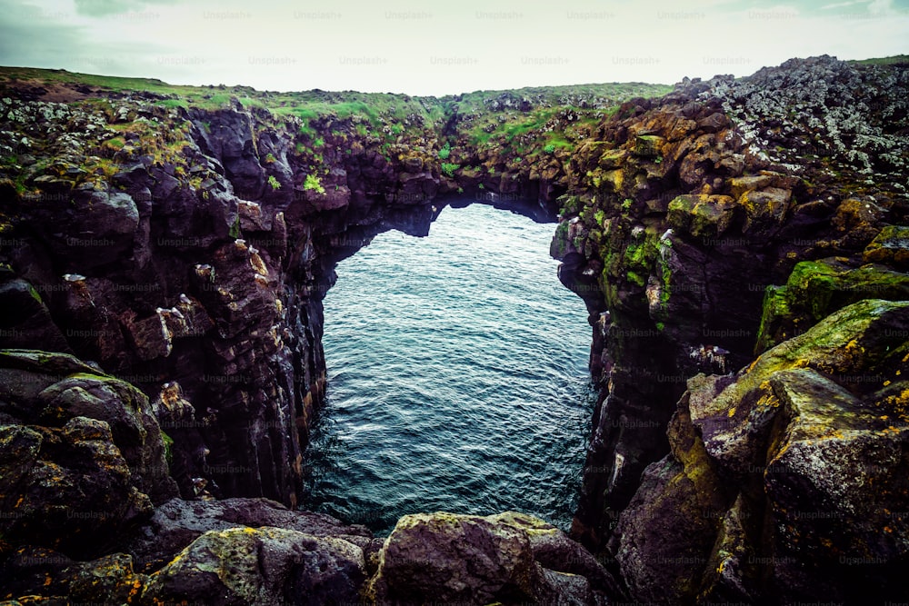 Rock bridge landscape in Arnarstapi, Iceland. Arnarstapi was an important trading post of West Iceland in the past.