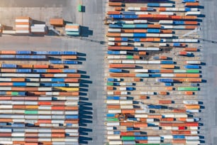 Aerial view of shipping containers on a dock at the port
