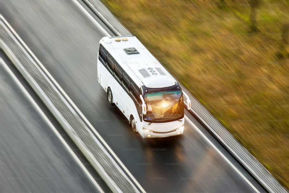 Tourist bus spee ride on highway, blured in motion