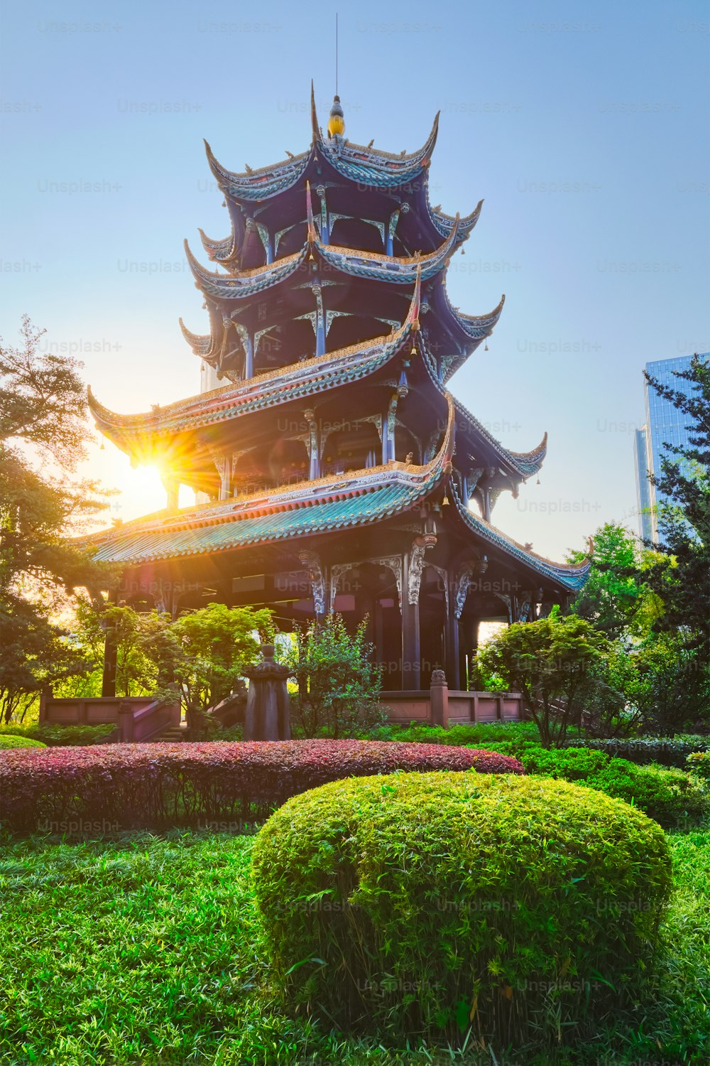 Wangjiang Pavilion (Wangjiang Tower) in Wangjianglou Park on sunrise with sun. Chengdu, Sichuan, China