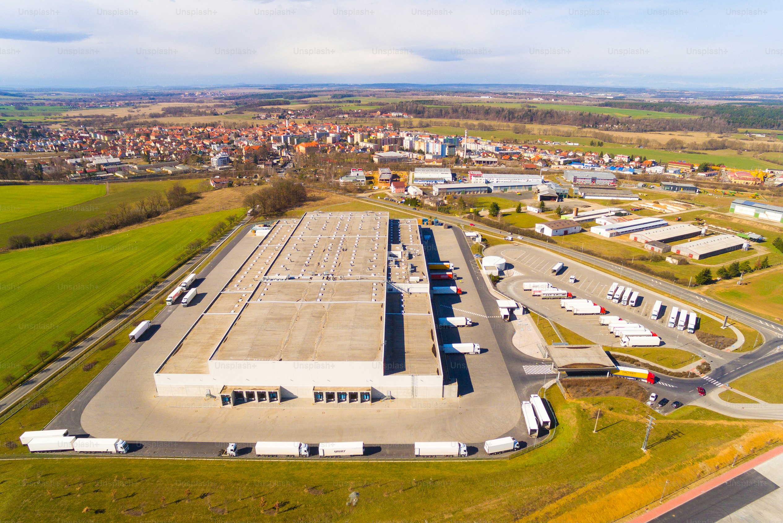 Aerial view of warehouse building in industrial district. photo