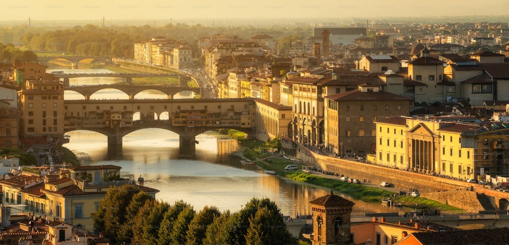 Florence Ponte Vecchio Bridge and City Skyline in Italy. Florence is capital city of the Tuscany region of central Italy. Florence was center of Italy medieval trade and wealthiest cities of past era.