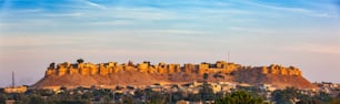 Panorama of Jaisalmer Fort - one of the largest forts in the world, known as the Golden Fort Sonar quila on sunrise. Jaisalmer, Rajasthan, India