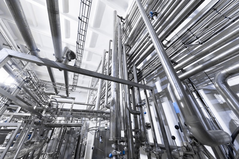 manufacturing molds, metal dies, factory floor, injection molding equipment