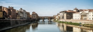 Florence Ponte Vecchio Bridge and City Skyline in Italy. Florence is capital city of the Tuscany region of central Italy. Florence was center of Italy medieval trade and wealthiest cities of past era.