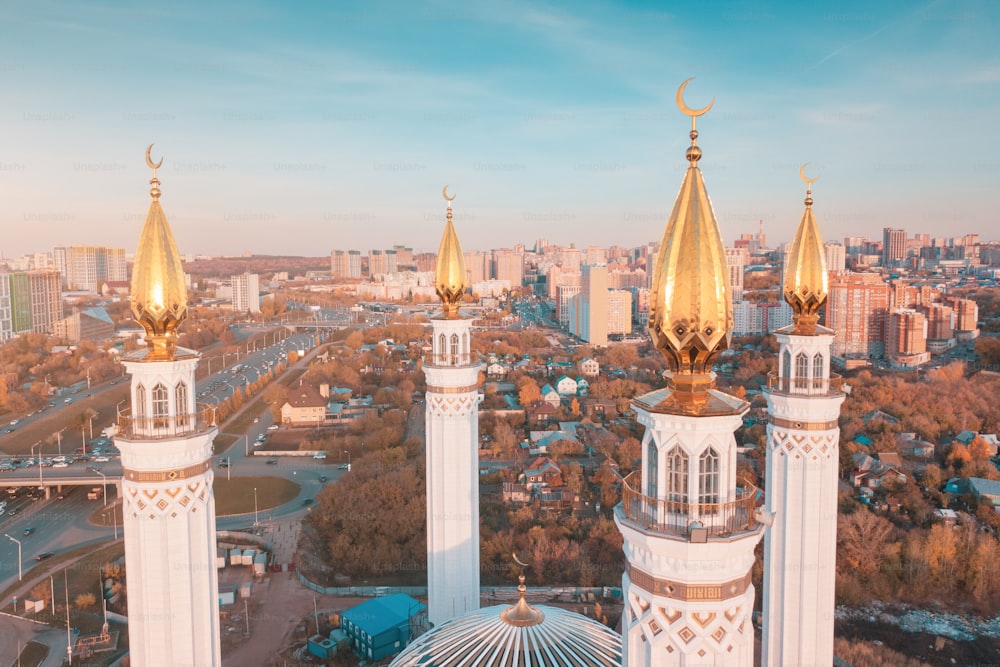 Aerial unusual view of minarets of a majestic mosque. Muslim and religion architecture concept