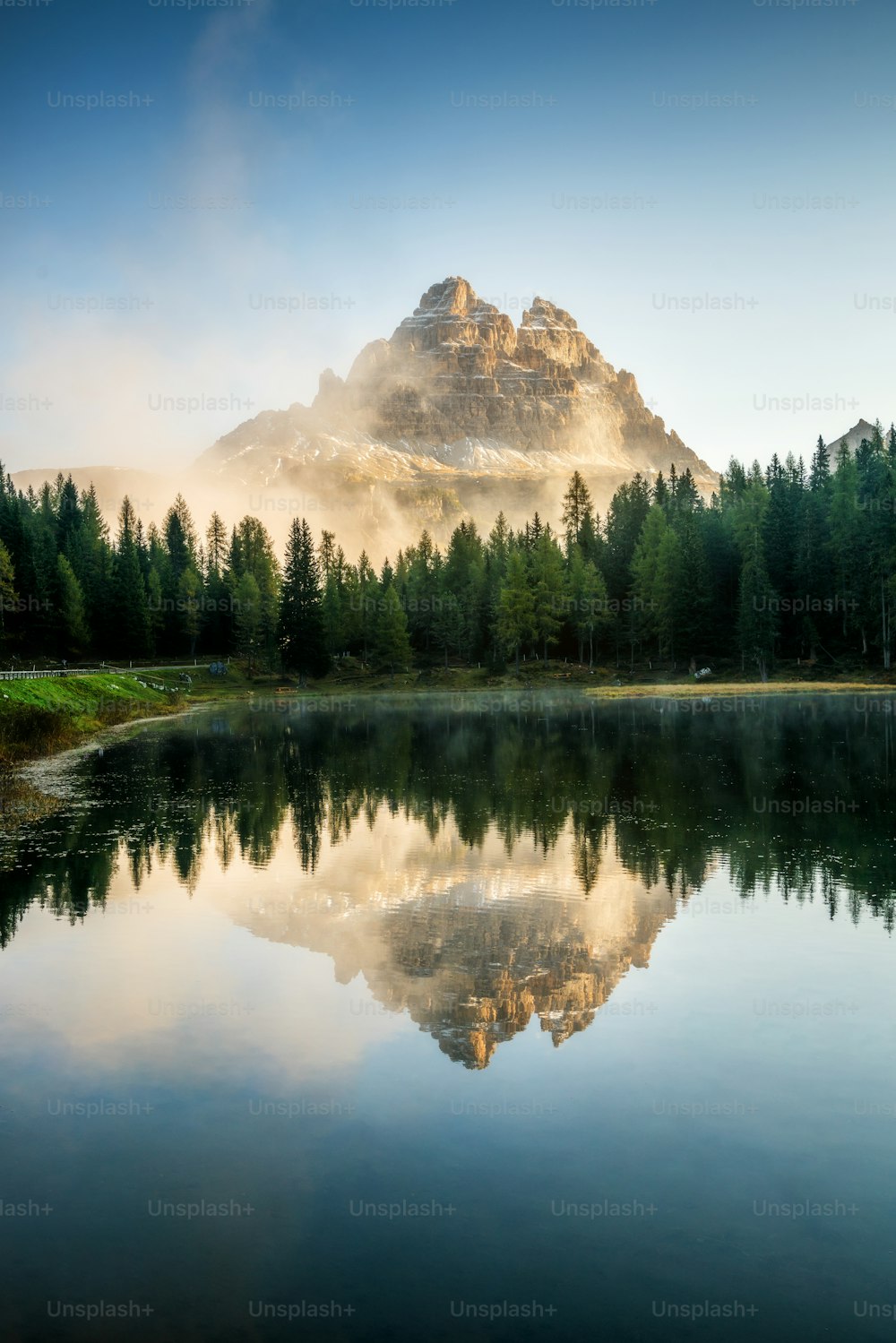 Majestic landscape of Antorno lake with famous Dolomites mountain peak of Tre Cime di Lavaredo in background in Eastern Dolomites, Italy Europe. Beautiful nature scenery and scenic travel destination.