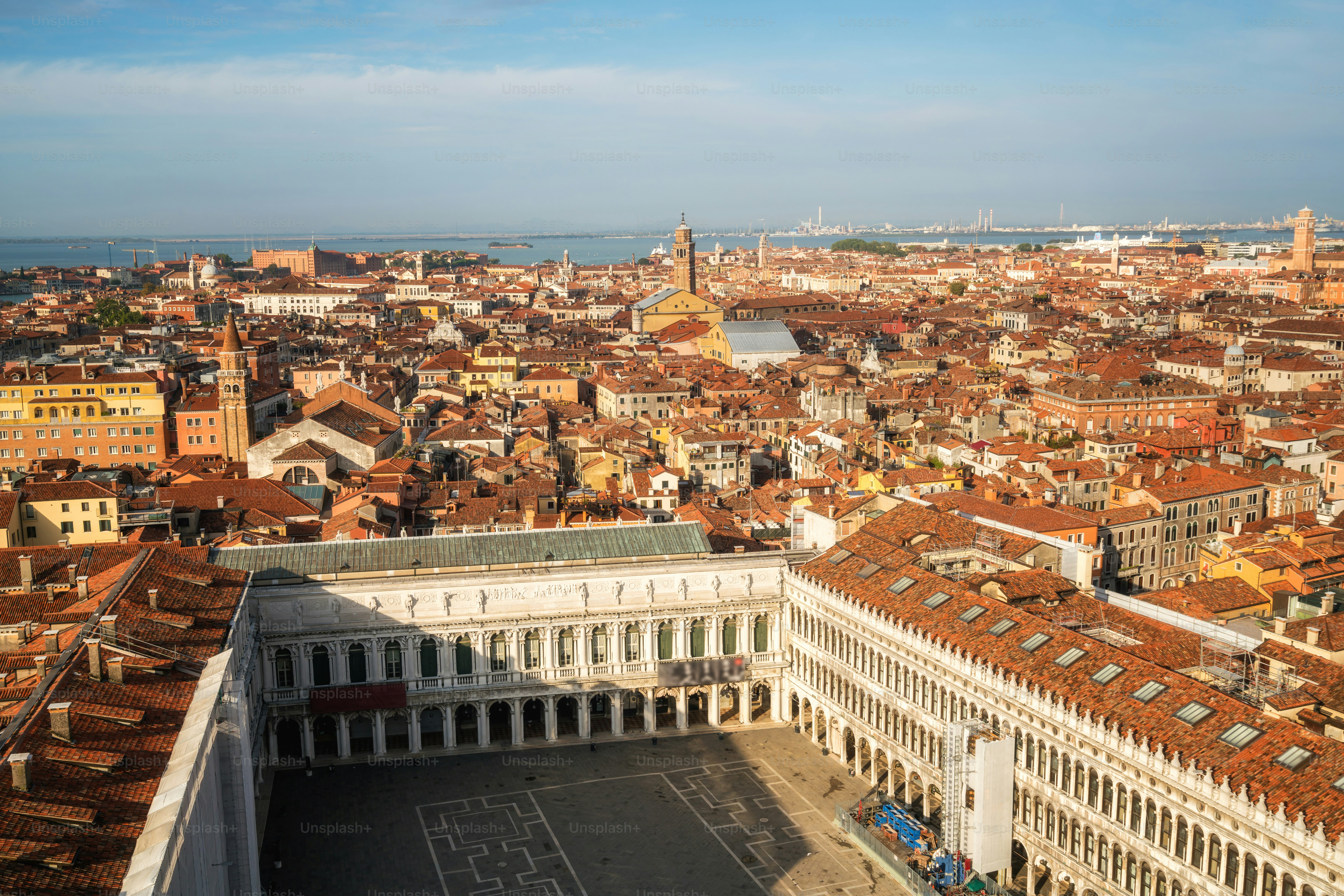 Aerial view of Venice city skyline from St. Mark's Square (Piazza San Marco) in Venice - Italy in sunny summer day. Venice is famous travel destination of Italy for its unique city and culture.