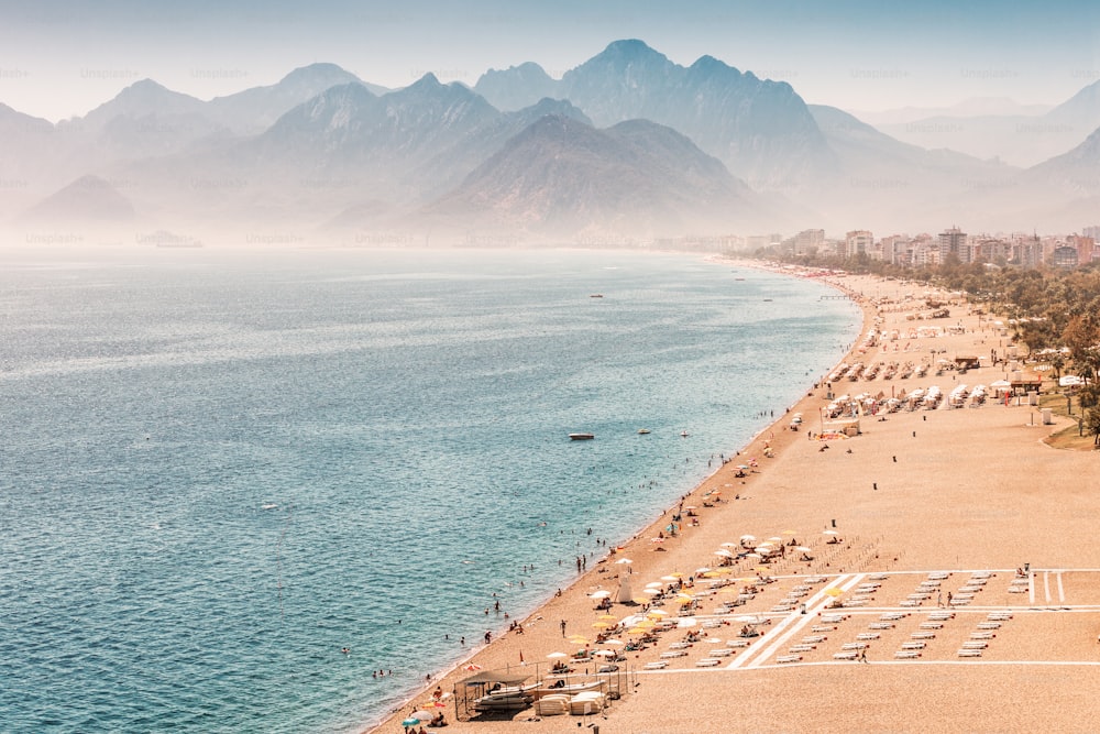 Aerial view of the famous longest Konyaalti beach in Antalya. Vacation and tour on the Mediterranean coast of Turkey