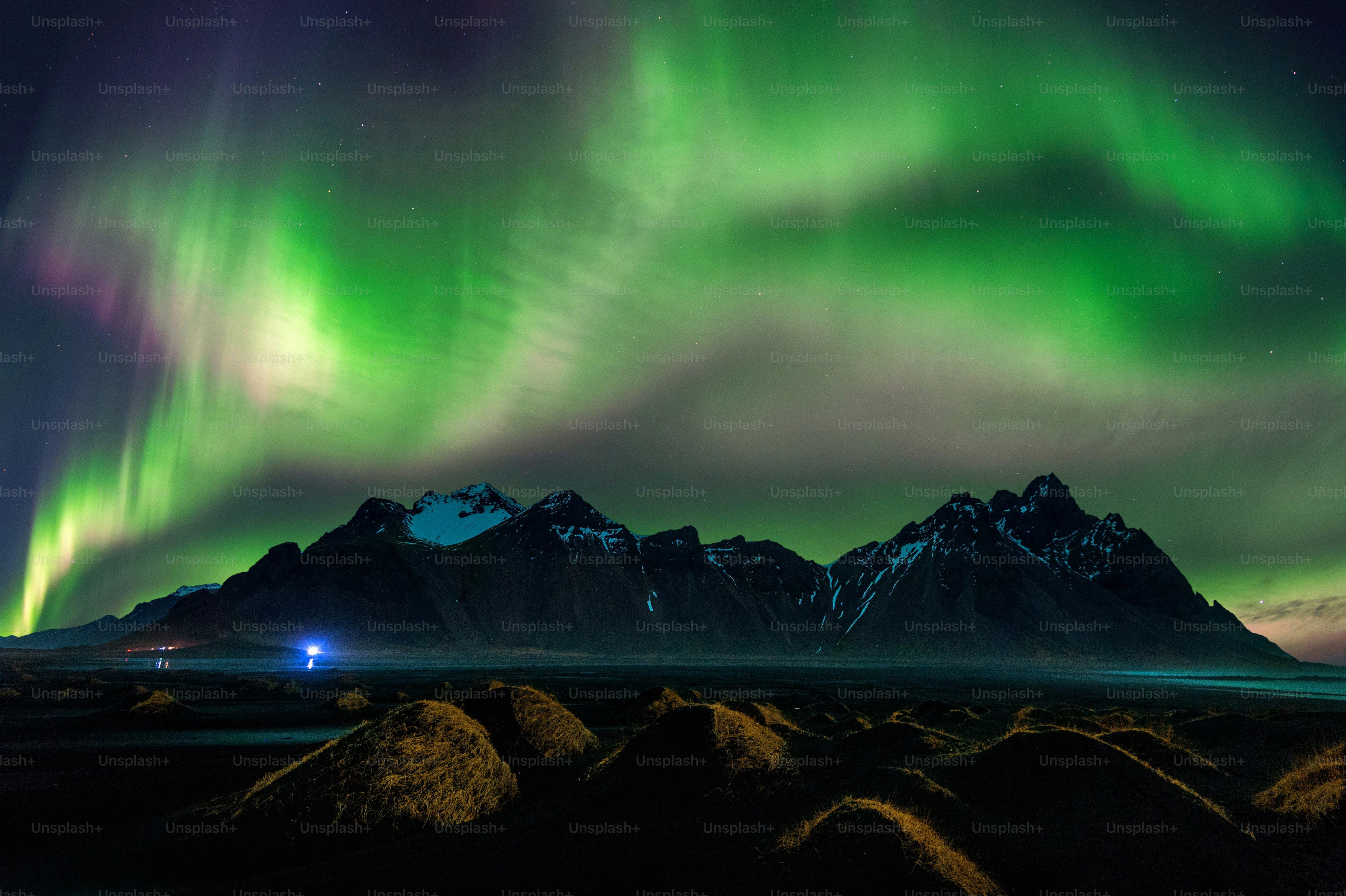 Northern Light, Aurora borealis at Vestrahorn mountains in Stokksnes