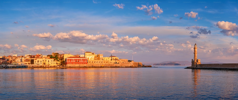 Panorama of picturesque old port of Chania is one of landmarks and tourist destinations of Crete island in the morning on sunrise. Chania, Crete, Greece