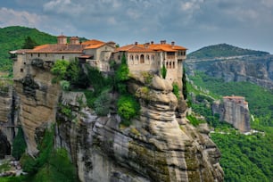 Monastery of Varlaam monastery and Monastery of Rousanou in famous greek tourist destination Meteora in Greece with scenic scenery landscape