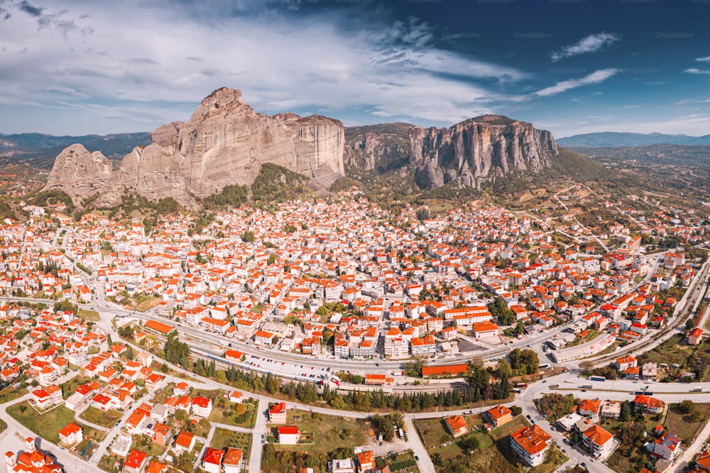Panoramic aerial view of the city of Kalabaka near the famous monasteries on the tops of stone pillars in Meteora. The concept of tourist accommodation and real estate in Greece.