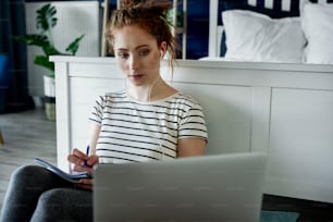 Woman focused on work on computer