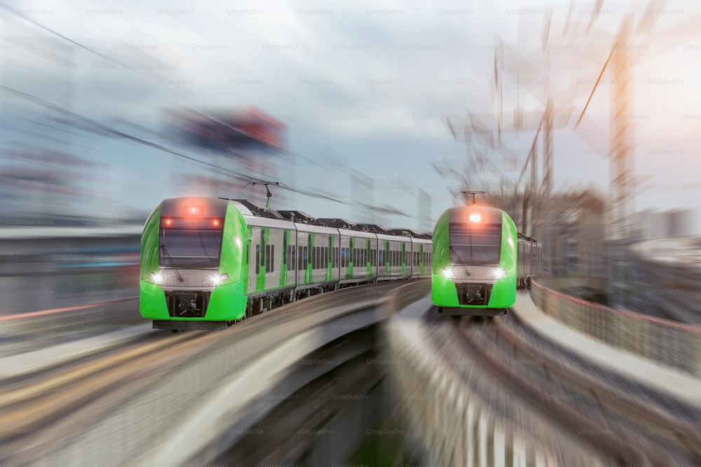 Two city passenger railway trains cross the bridge and turn at high speed