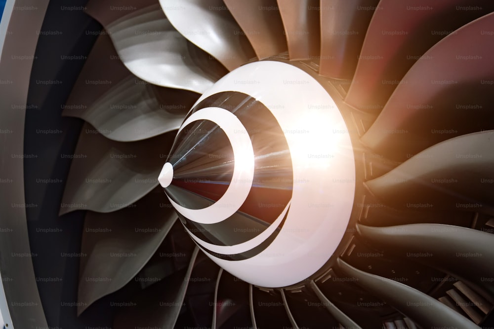 Turbo jet engine of airplane, close up in the light sparkle reflection