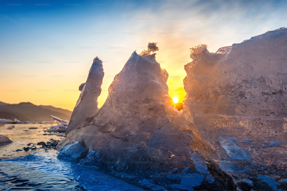 Very large and beautiful chunk of Ice at Sunrise in winter.