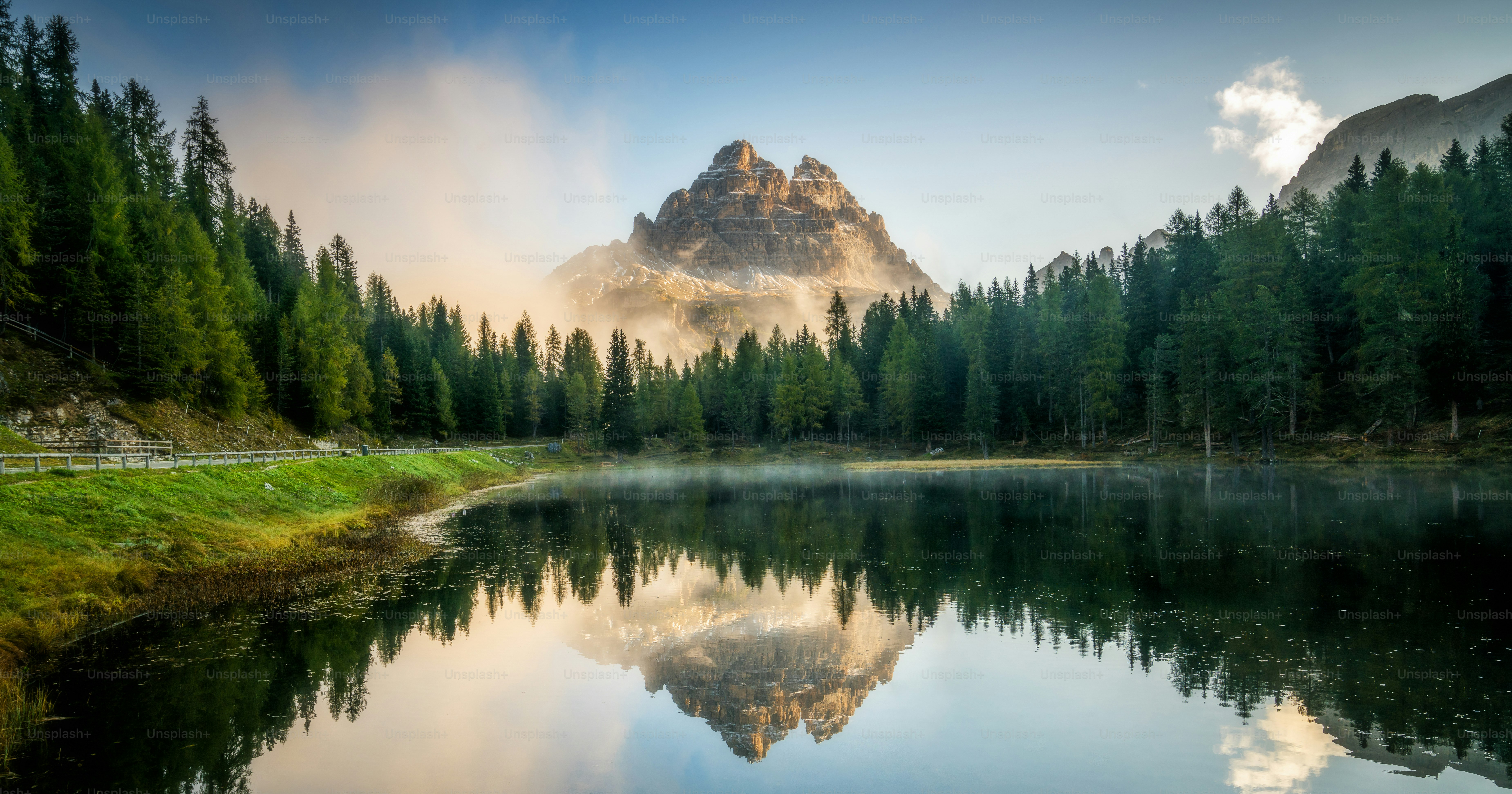 Majestic landscape of Antorno lake with famous Dolomites mountain peak of Tre Cime di Lavaredo in background in Eastern Dolomites, Italy Europe. Beautiful nature scenery and scenic travel destination.