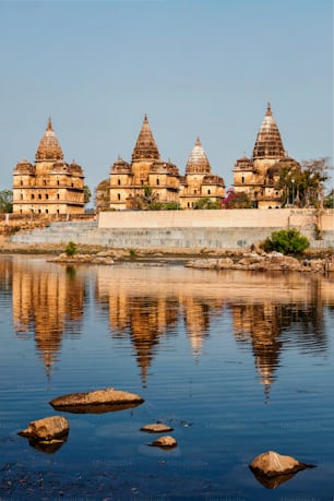 Tourist indian landmark - view of Royal cenotaphs of Orchha over Betwa river. Orchha, Madhya Pradesh, India