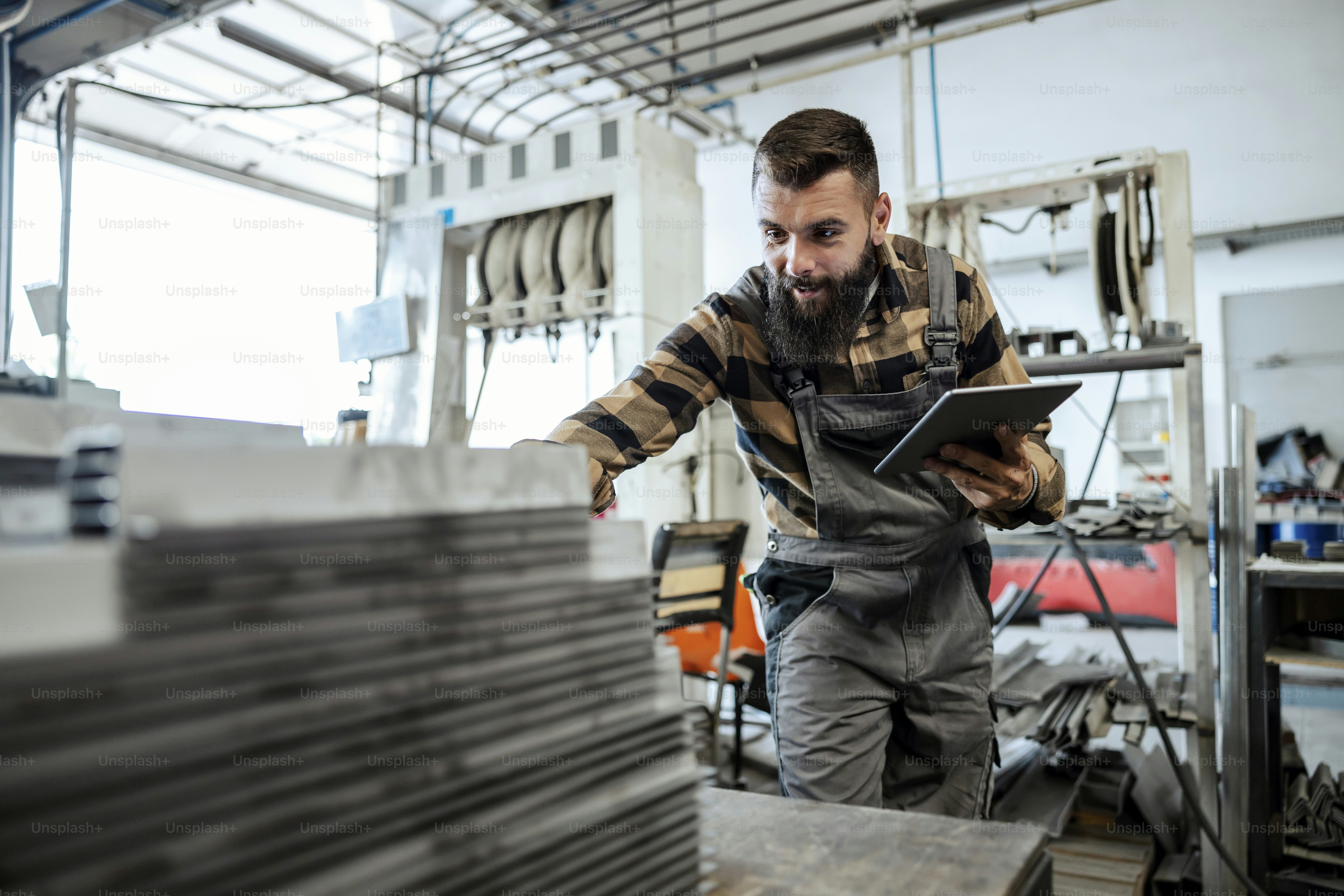 A worker checking on inventory in his Worker with