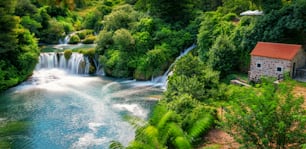 Panoramic landscape of Krka Waterfalls on the Krka river in Krka national park in Croatia.