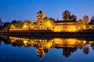 Wangjiang Pavilion (Wangjiang Tower) Park (Wangjianglou Park) view over Jinjiang River, Chengdu, Sichuan, China illuminated at night