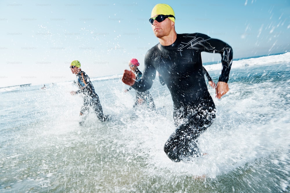 A group of athletes competing in a triathlon