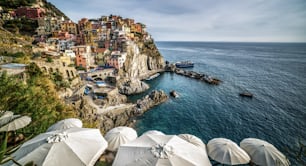 Manarola Village, Cinque Terre Coast of Italy. Manarola is a beautiful small town in the province of La Spezia, Liguria, north of Italy and one of the five Cinque terre travel attractions to tourists.