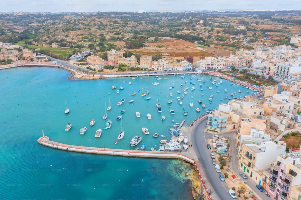 View from above, stunning aerial view of a bay with boats