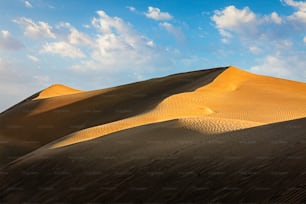Sam Sand dunes of Thar Desert under beautiful sky on sunset. Rajasthan, India