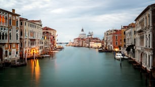 City of Venice , Italy with gorgeous view of the Venice Grand Canal and Basilica Santa Maria della Salute at sunrise. Venice is famous travel destination in Italy for its unique city and culture.