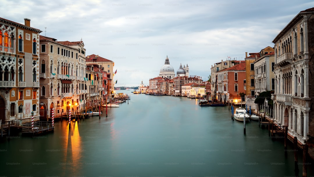 City of Venice , Italy with gorgeous view of the Venice Grand Canal and Basilica Santa Maria della Salute at sunrise. Ve