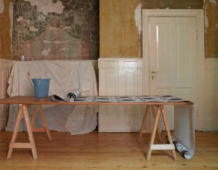 a wooden table with a cloth on top of it