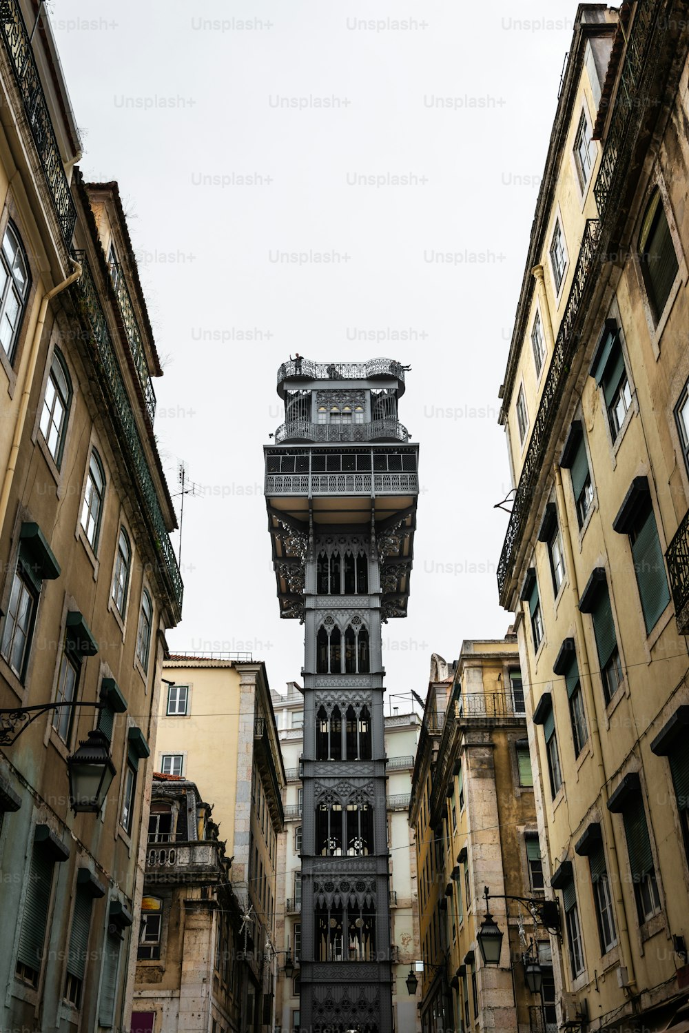 Elevador de Sant Justa (Santa Justa Lift) as seen from a narrow street in Baixa, Lisbon.