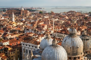 Aerial view of Venice city skyline from St. Mark's Square (Piazza San Marco) in Venice - Italy in sunny summer day. Venice is famous travel destination of Italy for its unique city and culture.