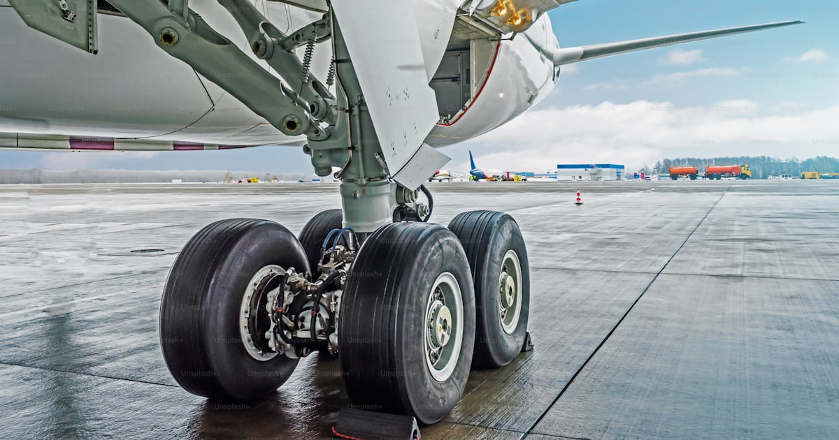 Wheels rubber tire rear landing gear racks airplane aircraft, under ...