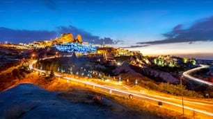 Uchisar Castle at night in Cappadocia, Turkey.