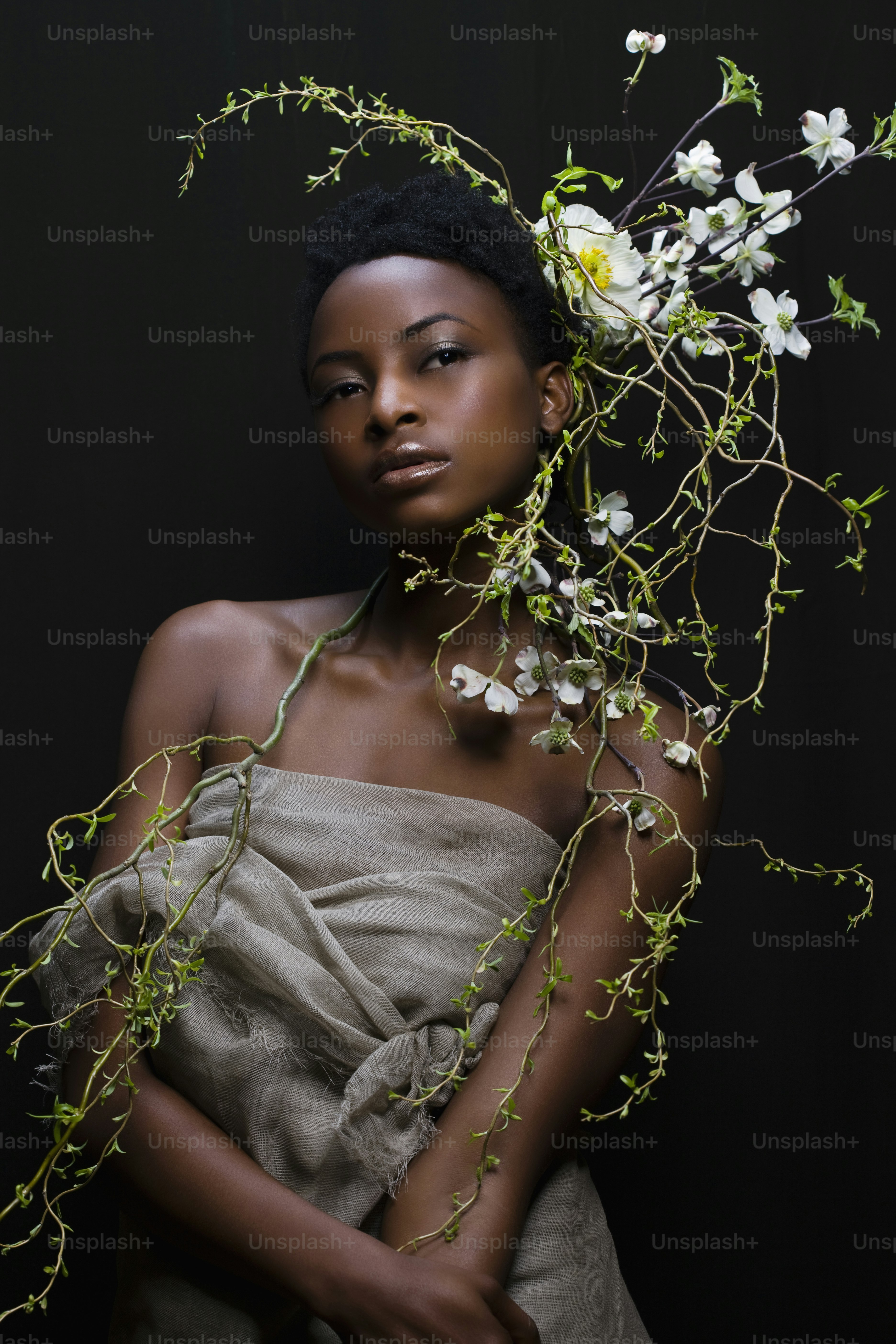 A woman in a dress with flowers on her head photo – Woman Image on Unsplash