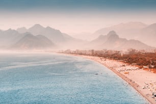 Aerial view of the famous longest Konyaalti beach in Antalya. Vacation and tour on the Mediterranean coast of Turkey